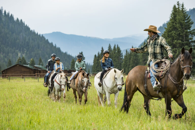 Guests on horseback during adventures By Disney wyoming vacation