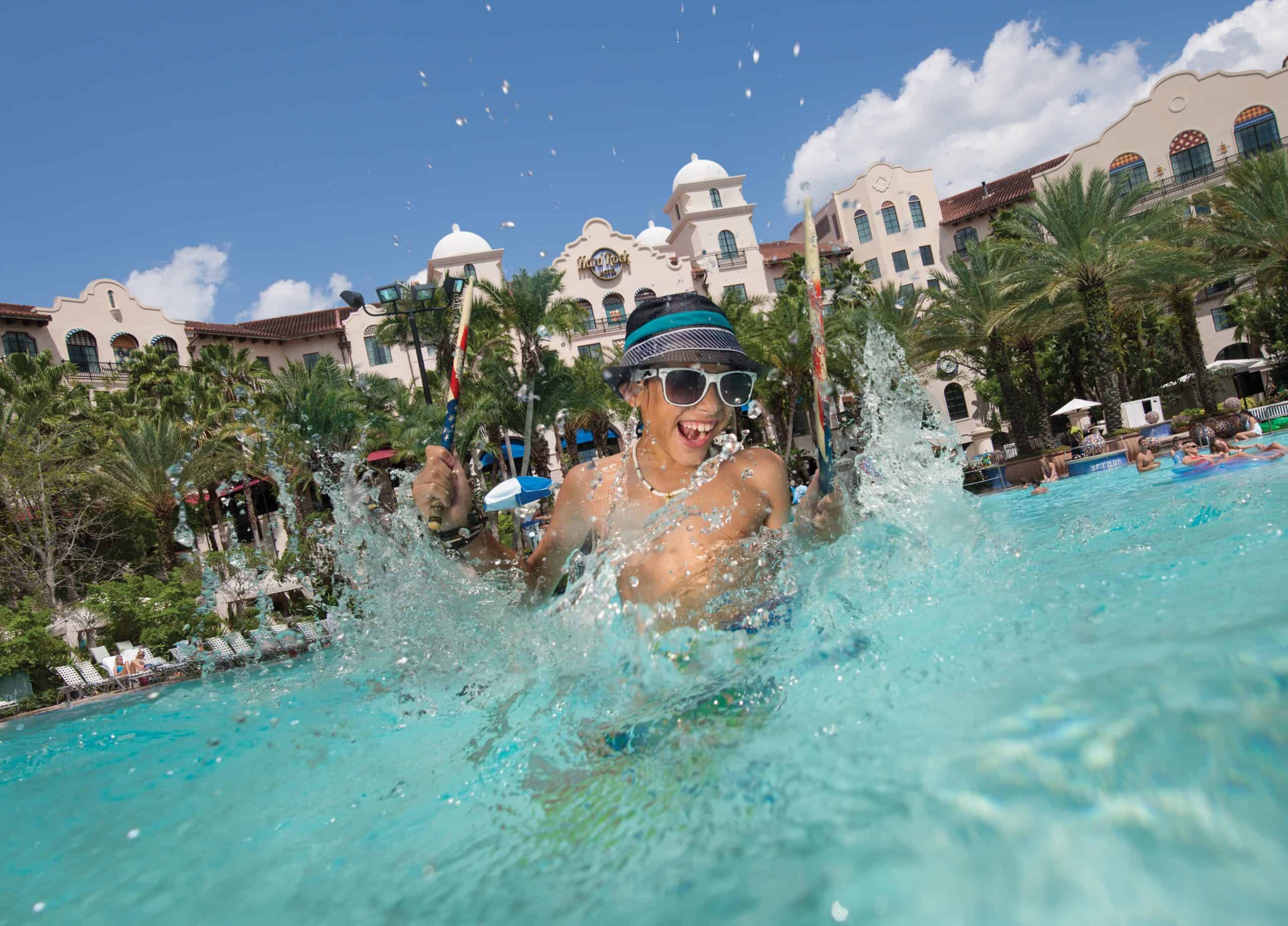 Hard Rock hotel in Universal Orlando with smiling guest during day
