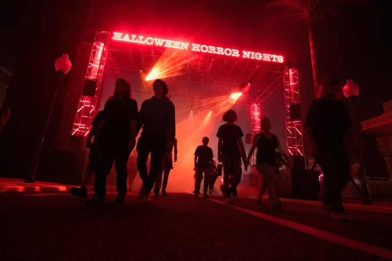 people walking through scare zone at Halloween Horror Nights at Universal Orlando