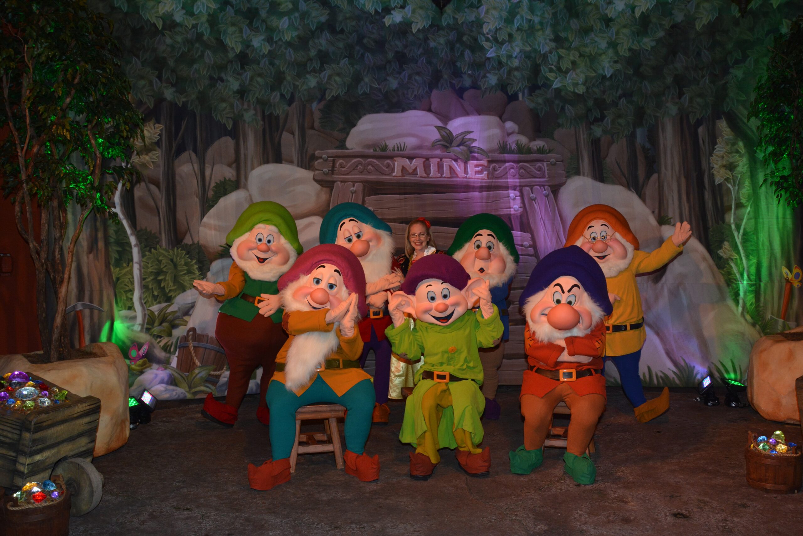 Picture of Seven Dwarfs with guest dressed as Snow with at Mickeys Not So Scary Halloween Party ( MNSSHP ) in a special character photo opportunity only available during the party
