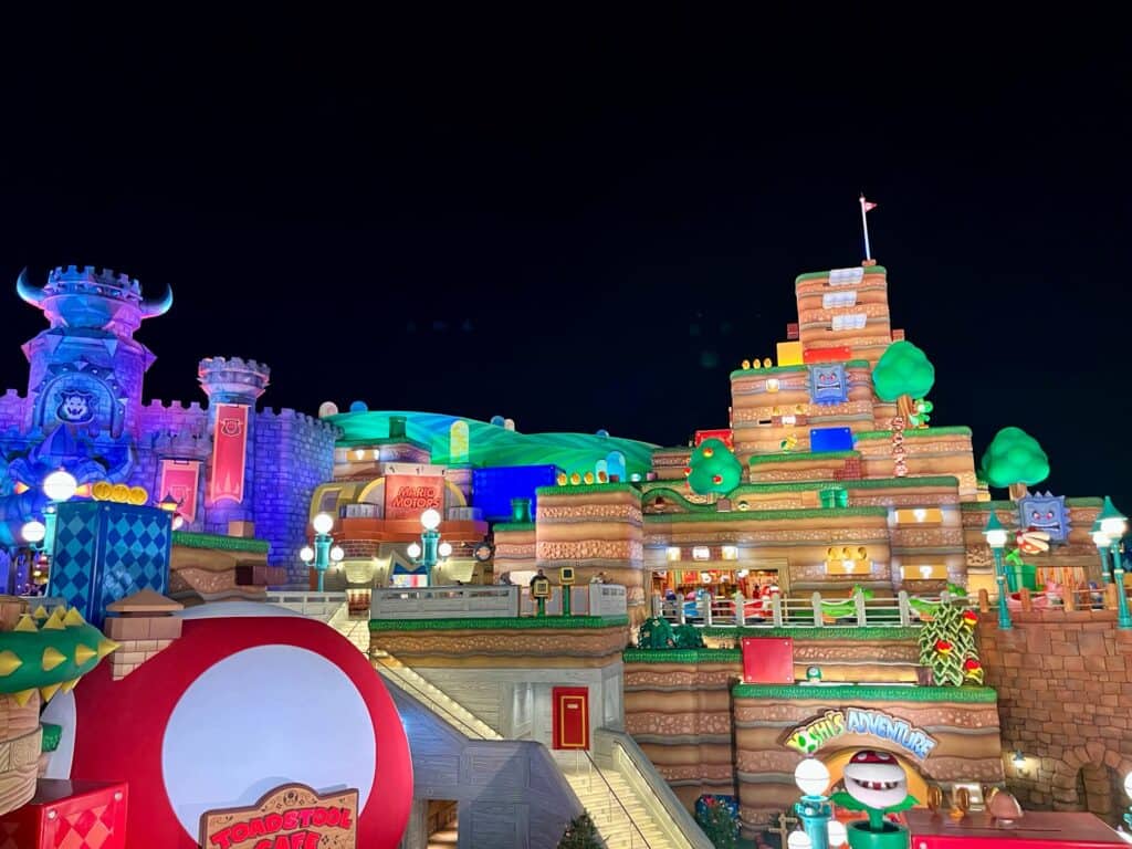 Night time shot of Super Nintendo world in Universal Orlando Epic Universe