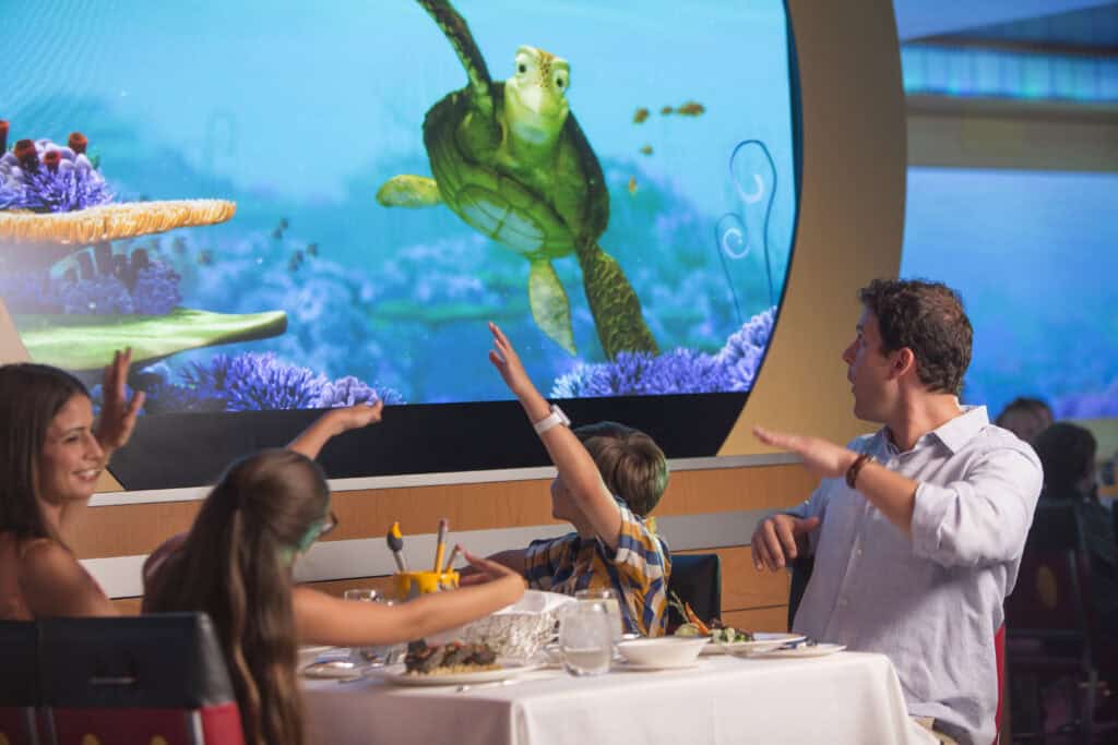 Family eating dinner together on a Disney Cruise from Galveston