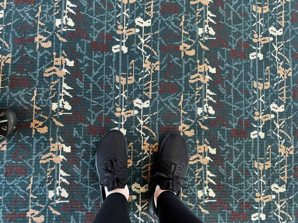 Feet on the iconic carpet at MCO airport